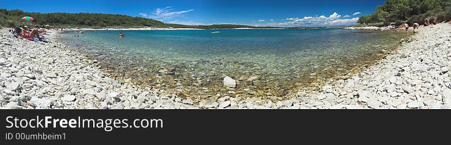 Rocky beautiful beach, panoramic horizontal image. Rocky beautiful beach, panoramic horizontal image