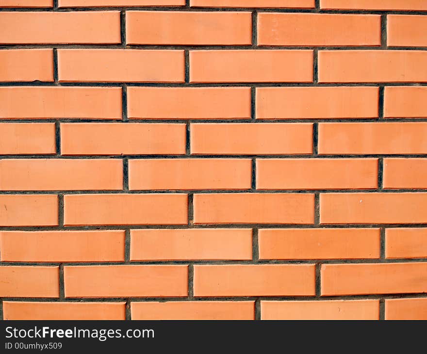 Wall made of red and yellow bricks. Wall made of red and yellow bricks