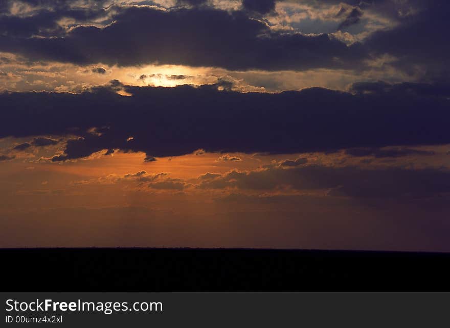 Sunset light and colourful clouds