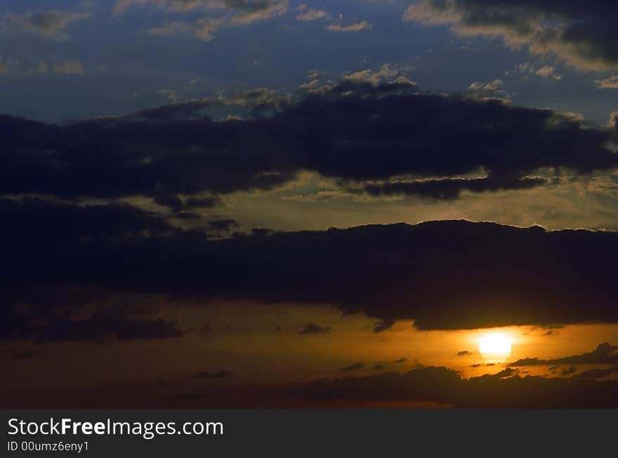 Sunset light and colourful clouds