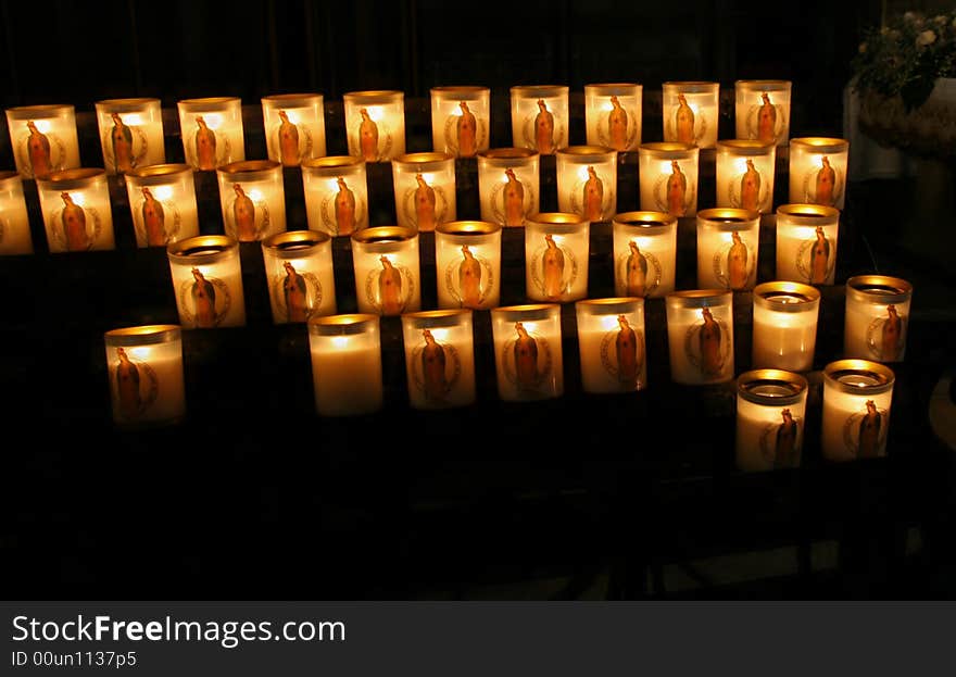 Fired candles in church (France - Notre Damme).