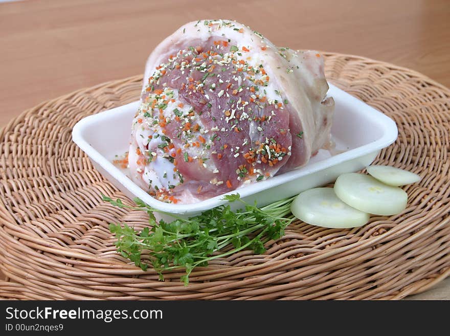 Ham strewed by seasoning with an onions