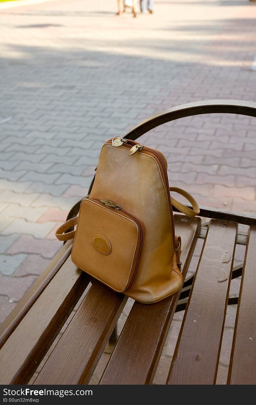 Photo of knapsack lost by an young lady on the bench. Photo of knapsack lost by an young lady on the bench