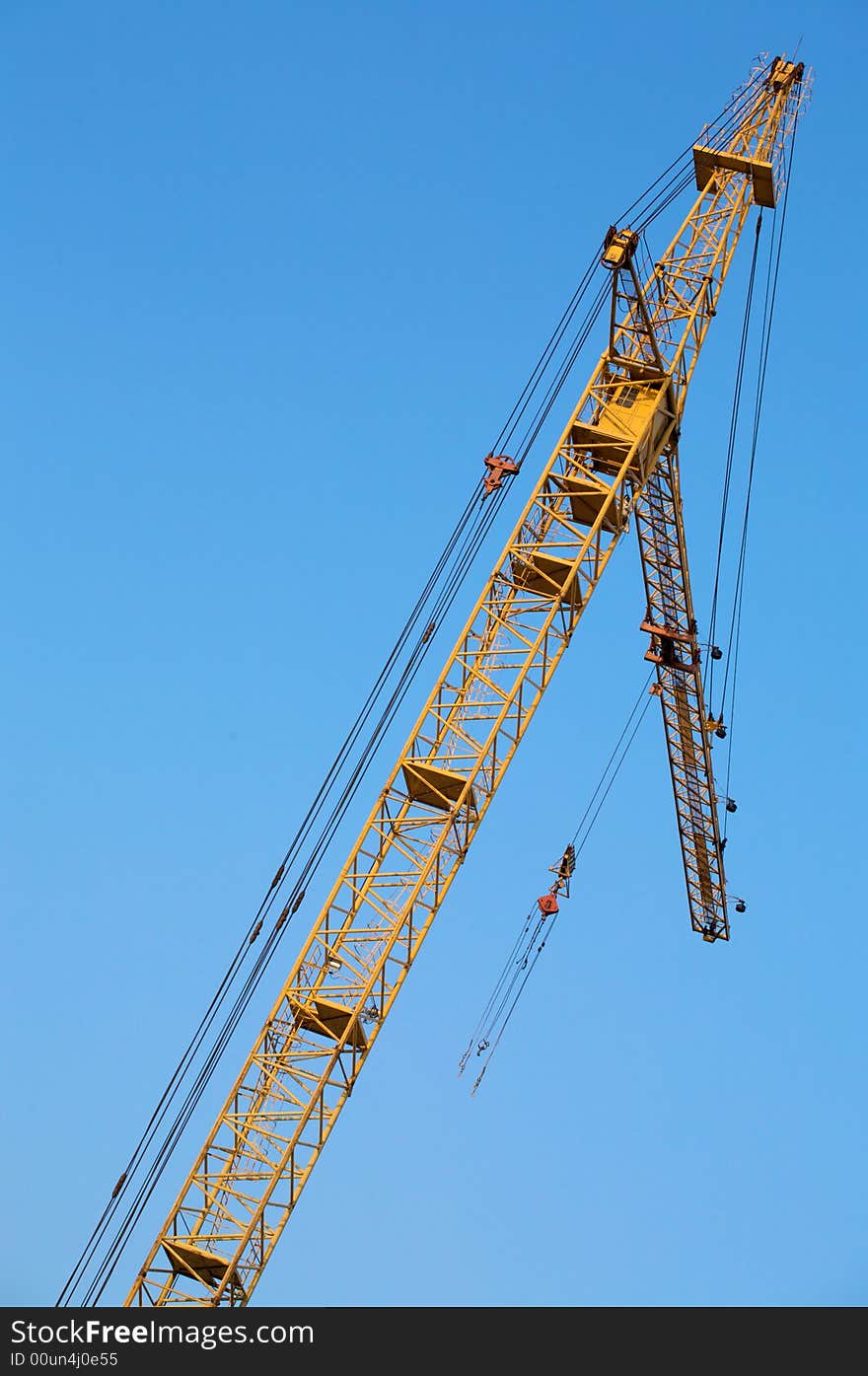 Crane with a blue sky on a background