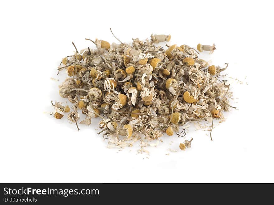 Dried chamomile on a white background. Dried chamomile on a white background.