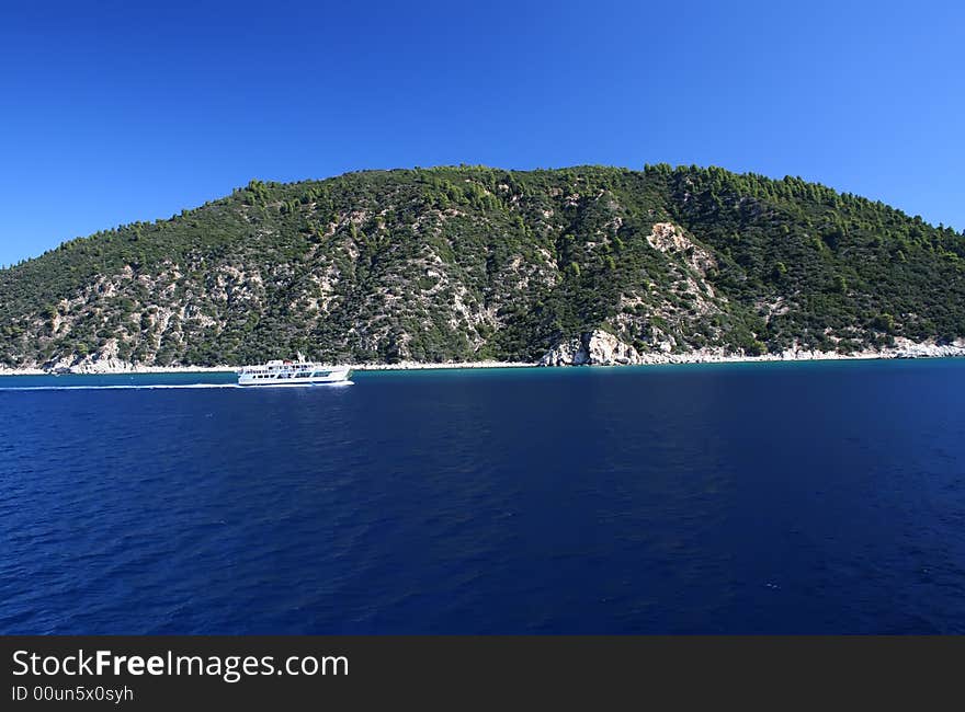 Tropical blue sea landscape with ferry