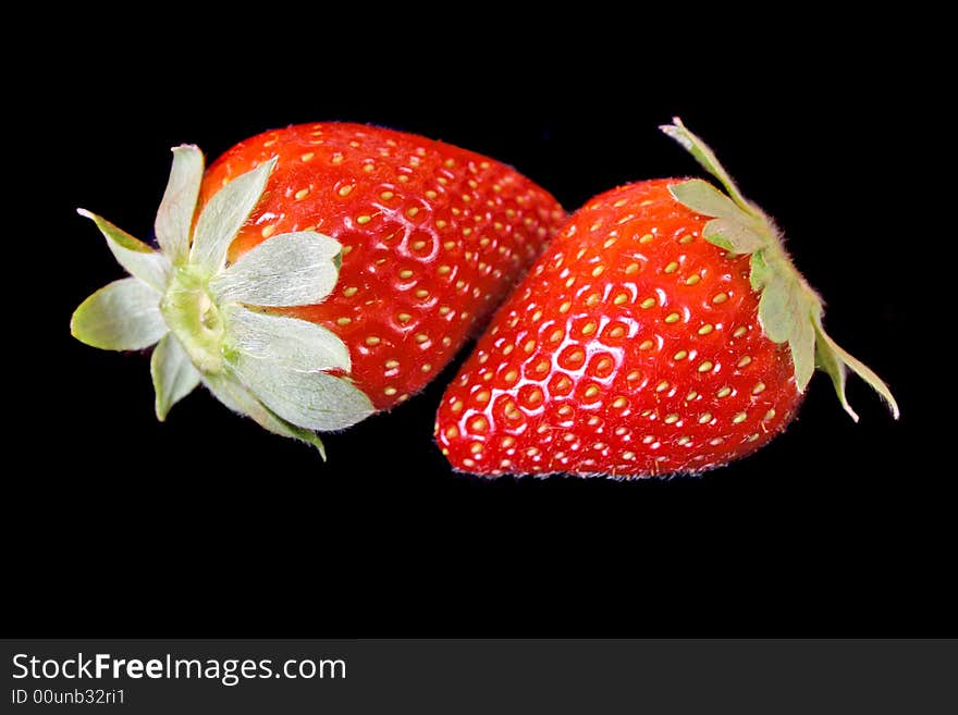 Strawberries isolated on black background. Strawberries isolated on black background