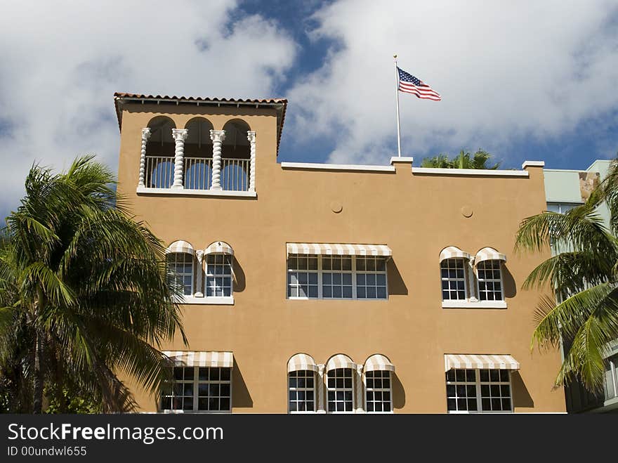 Hotel art deco architecture south beach miami florida with american flag. Hotel art deco architecture south beach miami florida with american flag