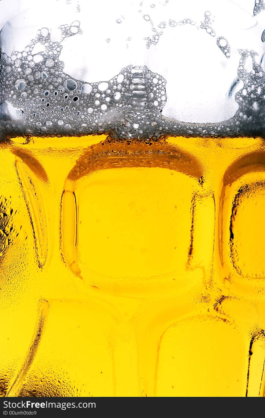 Closeup of beer in a beer mug. Closeup of beer in a beer mug