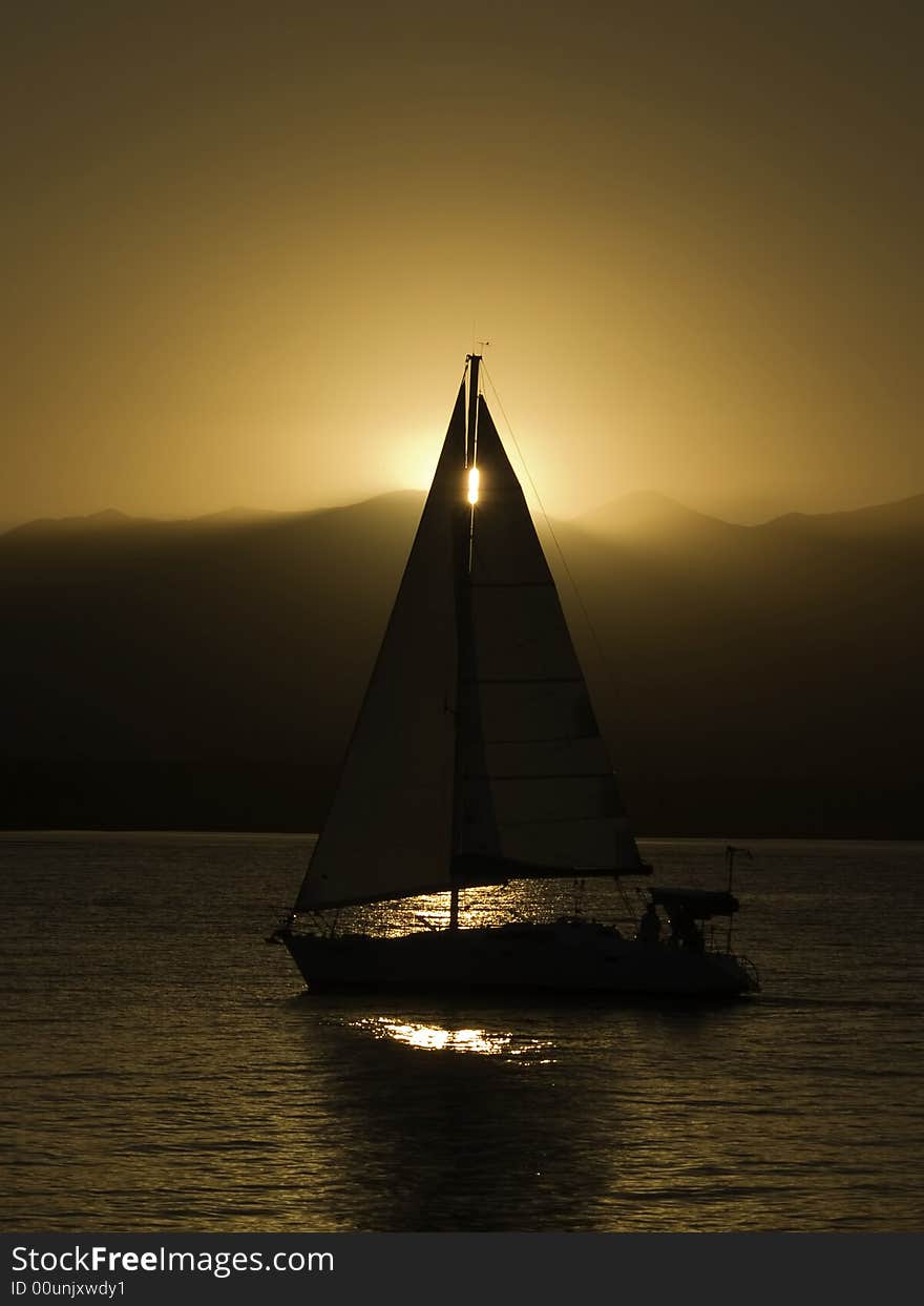 A sunset cruise coming back into port. A sunset cruise coming back into port.