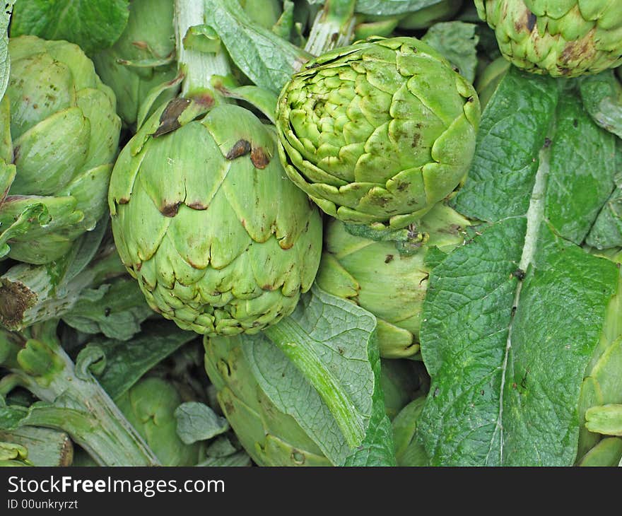 Raw artichokes at a market