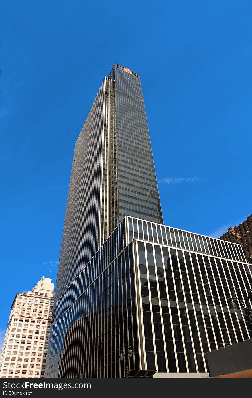 Reflective corporate buildings on a clear day in manhattan. Reflective corporate buildings on a clear day in manhattan