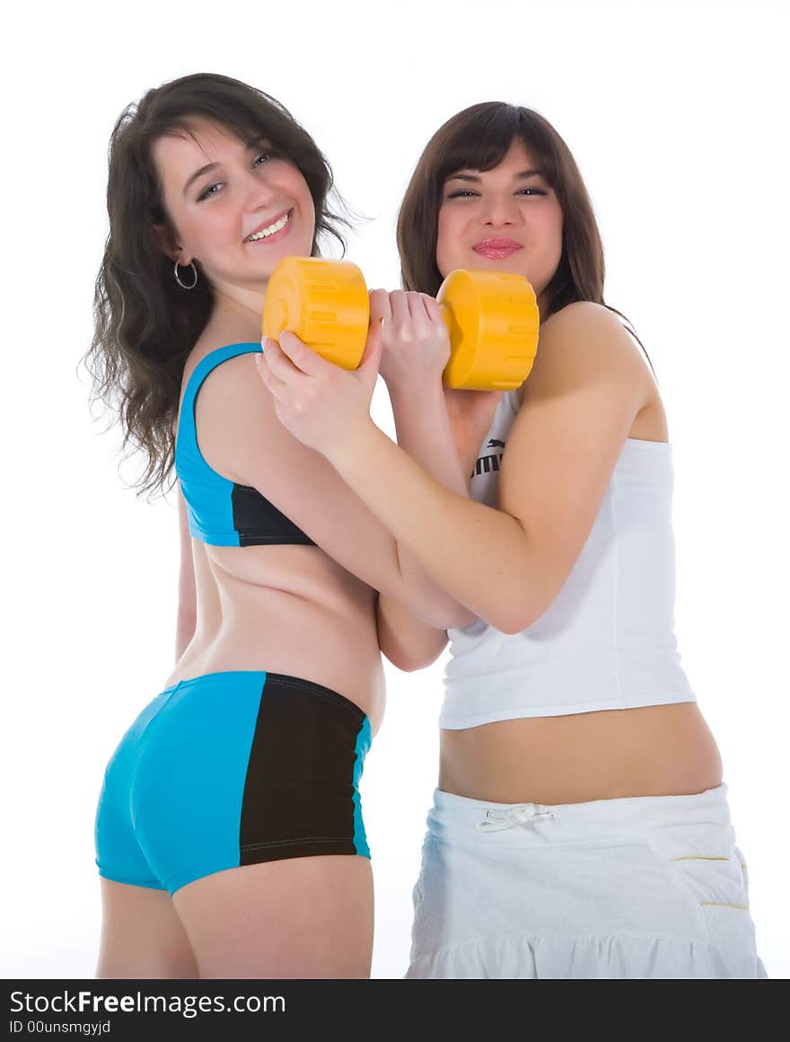 Girls practicing fitness  on  white  background