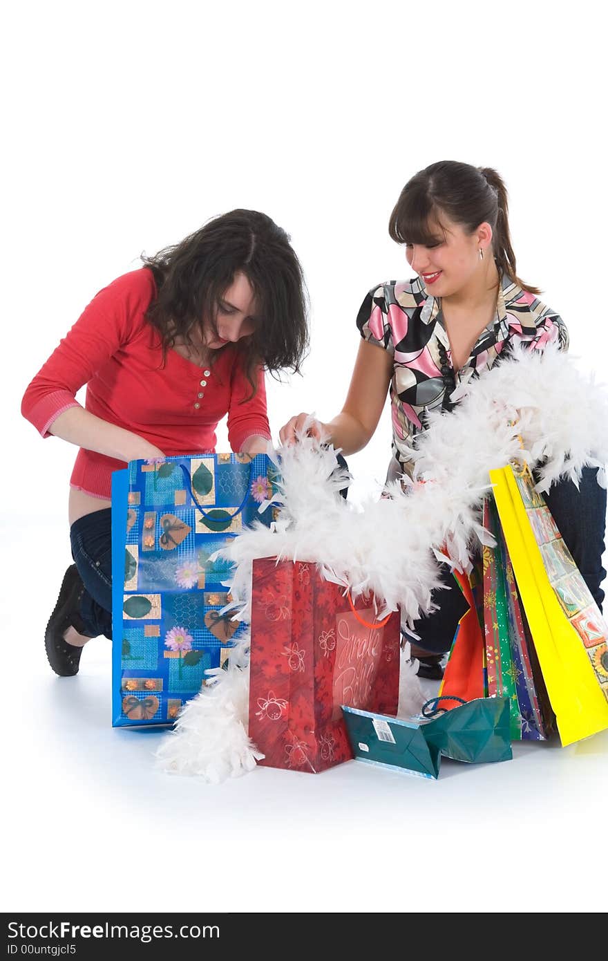 Expressive girls  on white background  shopping. Expressive girls  on white background  shopping