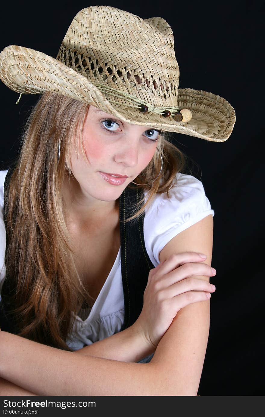 Beautiful model with blue eyes and straw hat. Beautiful model with blue eyes and straw hat