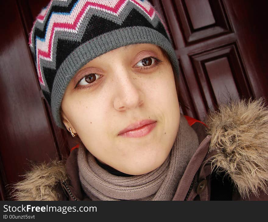 Closeup portrait of a girl in cap