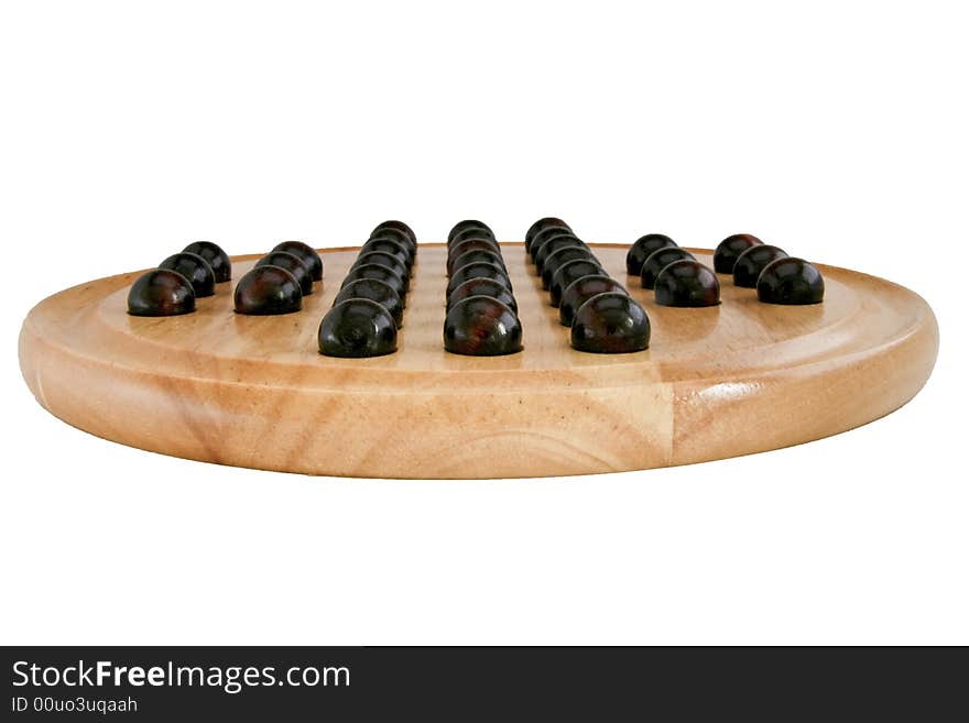 Wooden chinese game with marbles known as solitaire. Wooden chinese game with marbles known as solitaire