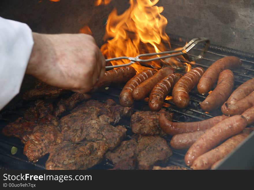 Close up of grilled meat and sausage, outdoor. Close up of grilled meat and sausage, outdoor