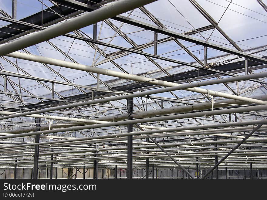 The roof conruction of a greenhouse with diagonal, horizontal and vertical lines