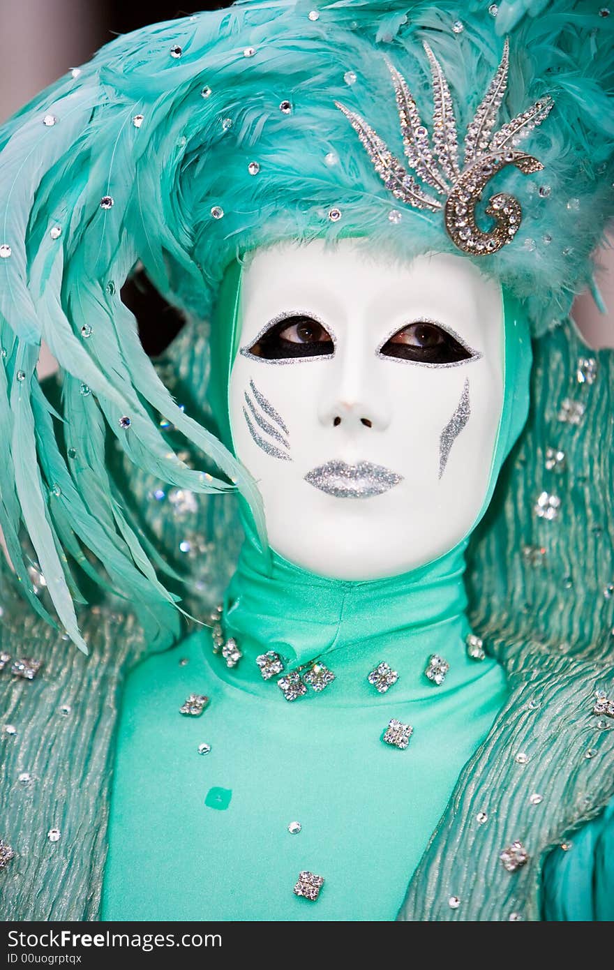 Wonderful turquoise costume at the Venice Carnival. Wonderful turquoise costume at the Venice Carnival