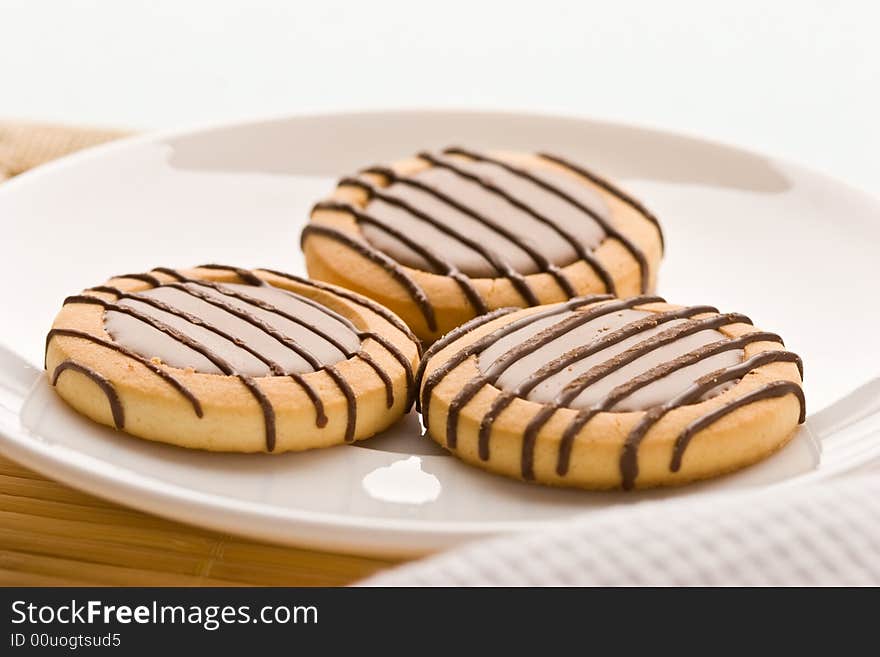 Food series: sweet chocolate pastry on the white plate