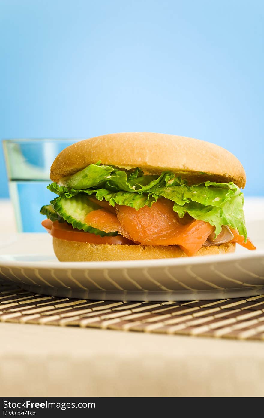 Cold smoked salmon bagel on the table