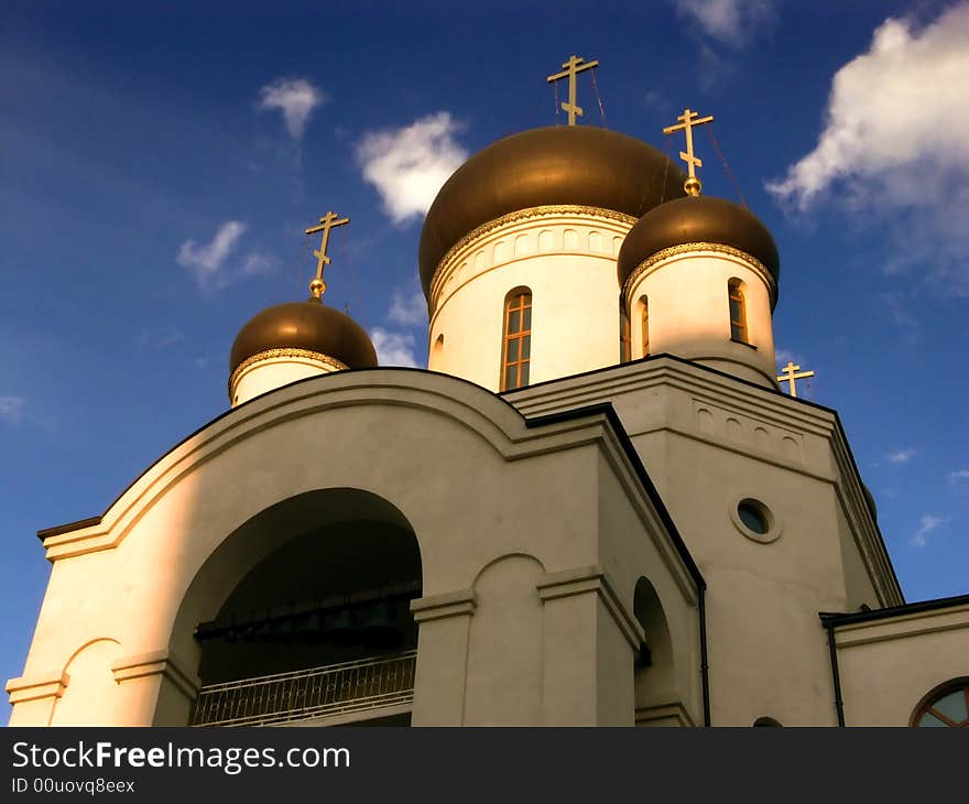 Evening Spring. Cupola churches and crosses against the backdrop of the sky.