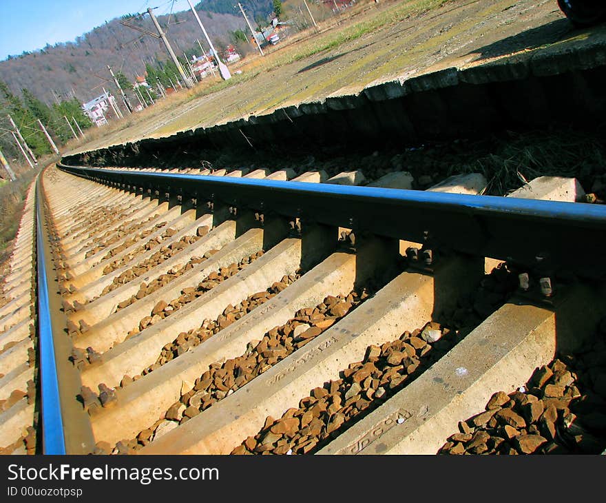 Railroad near the mountains, leading far away...