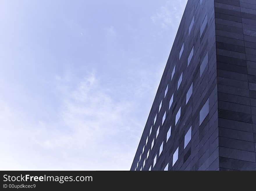 Abstract building over blue sky. Blue toned, copy spaced. Abstract building over blue sky. Blue toned, copy spaced.