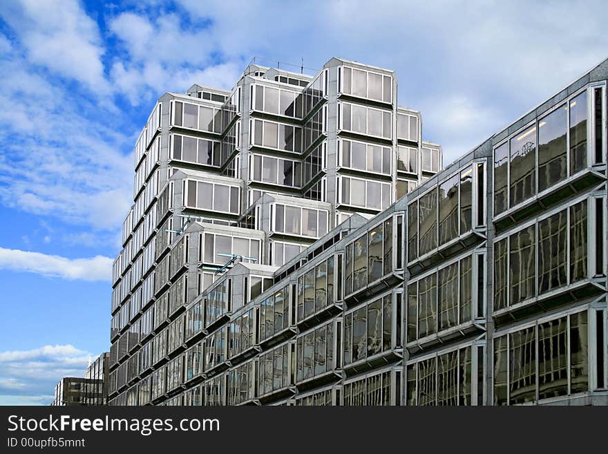 Geometric business building all in brown glass. Geometric business building all in brown glass