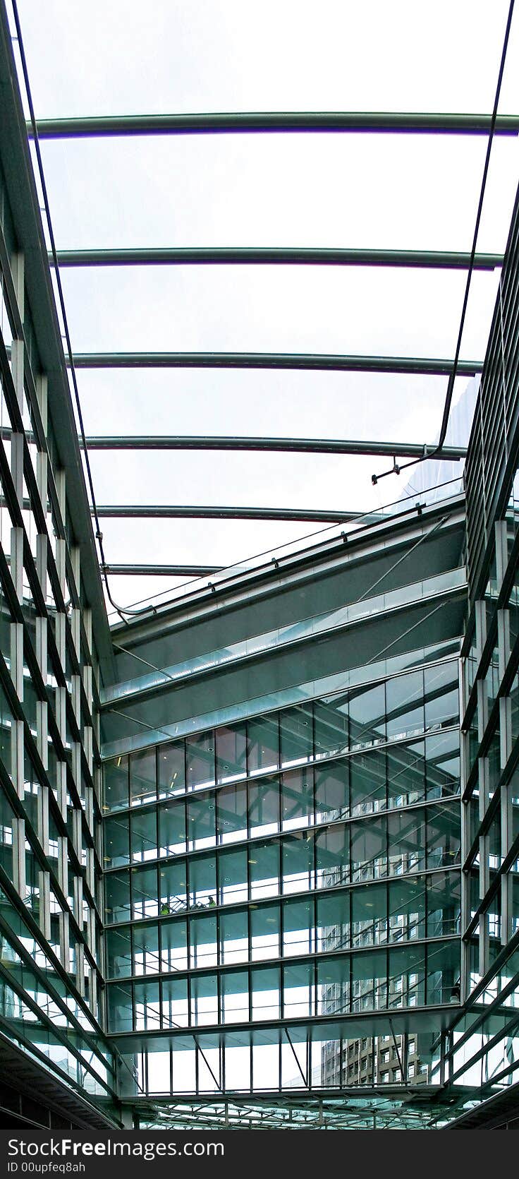 Business building pedestrian bridge all in glass. Business building pedestrian bridge all in glass