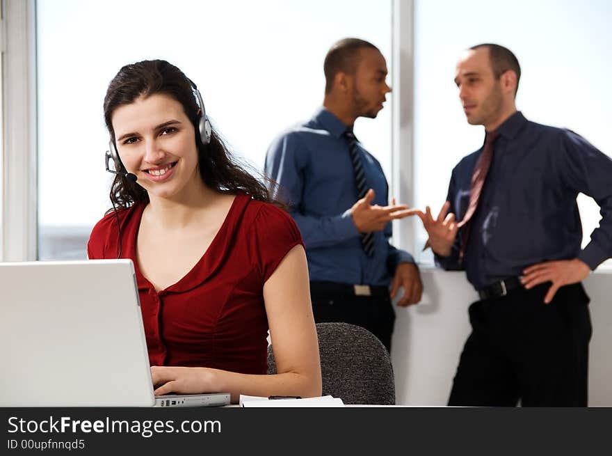 Business team with a woman in the foreground