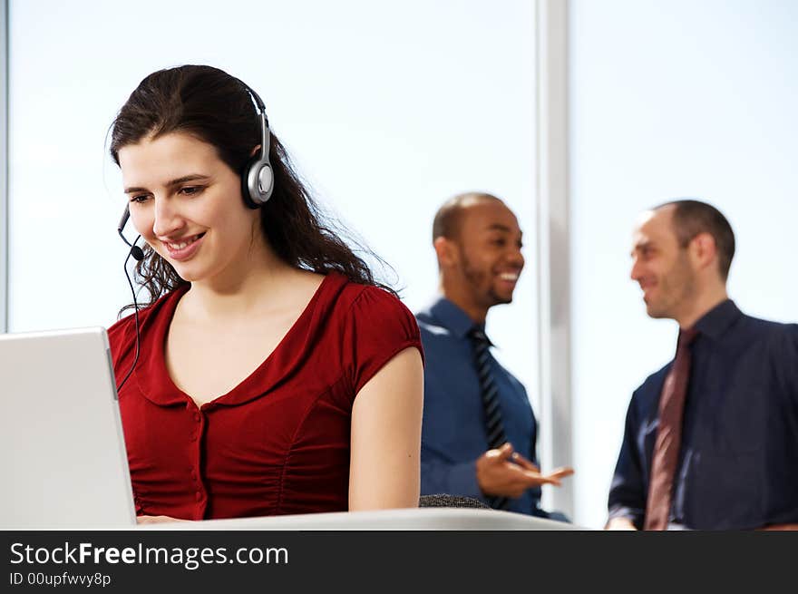 Business team with a woman in the foreground