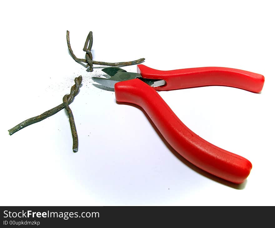 Flat-nose pliers cut the small wire little man. Flat-nose pliers cut the small wire little man