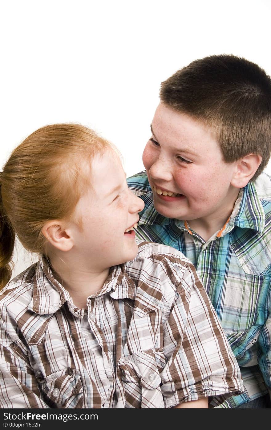 Happily brother and sister looking at each other