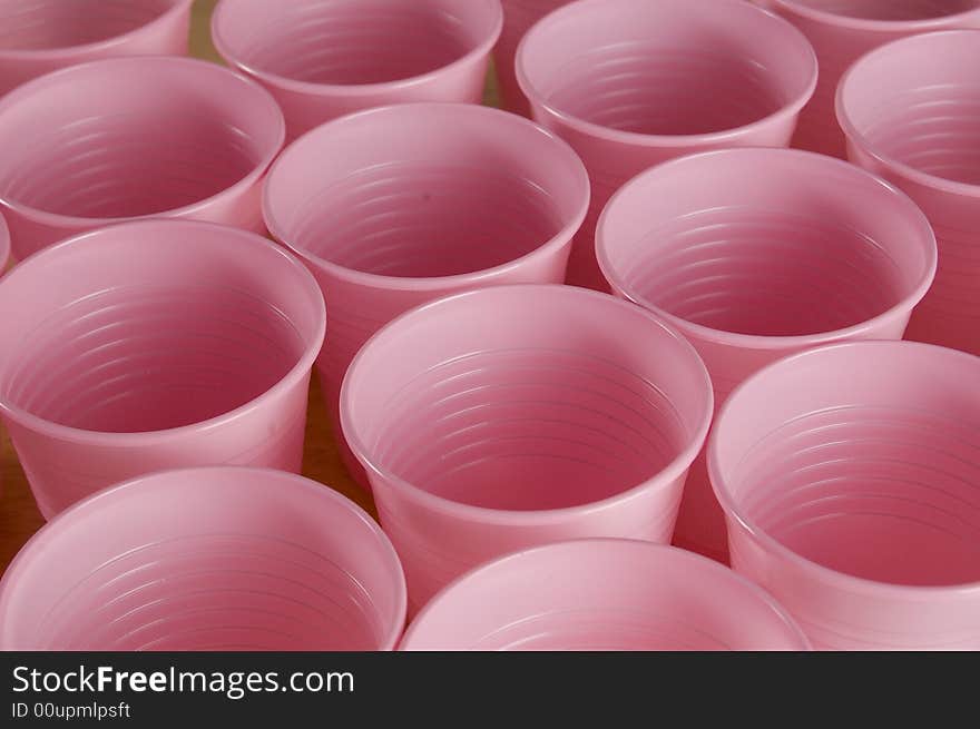 A lot of pink plastic cups