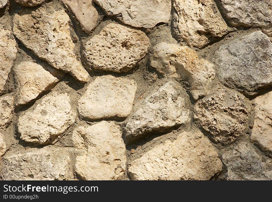 Wall built from limestone, textured background. Wall built from limestone, textured background