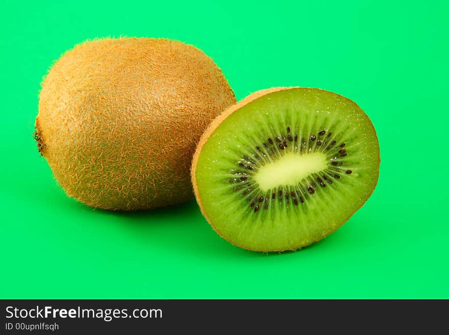 Kiwi isolated on green background