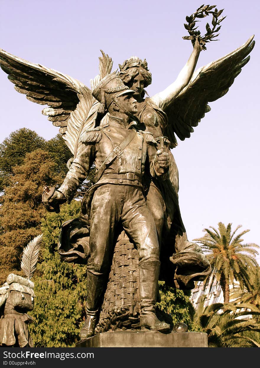 Buenos Aires, Argentina.
The image shows a statue of a man and an angel. Buenos Aires, Argentina.
The image shows a statue of a man and an angel.