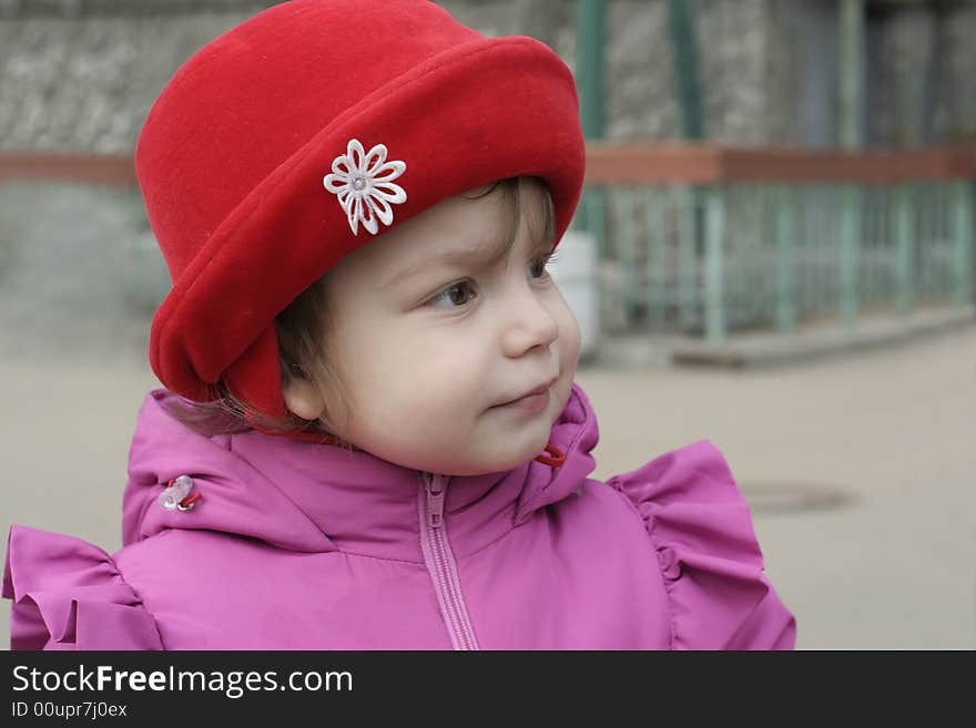 Little girl in red hat