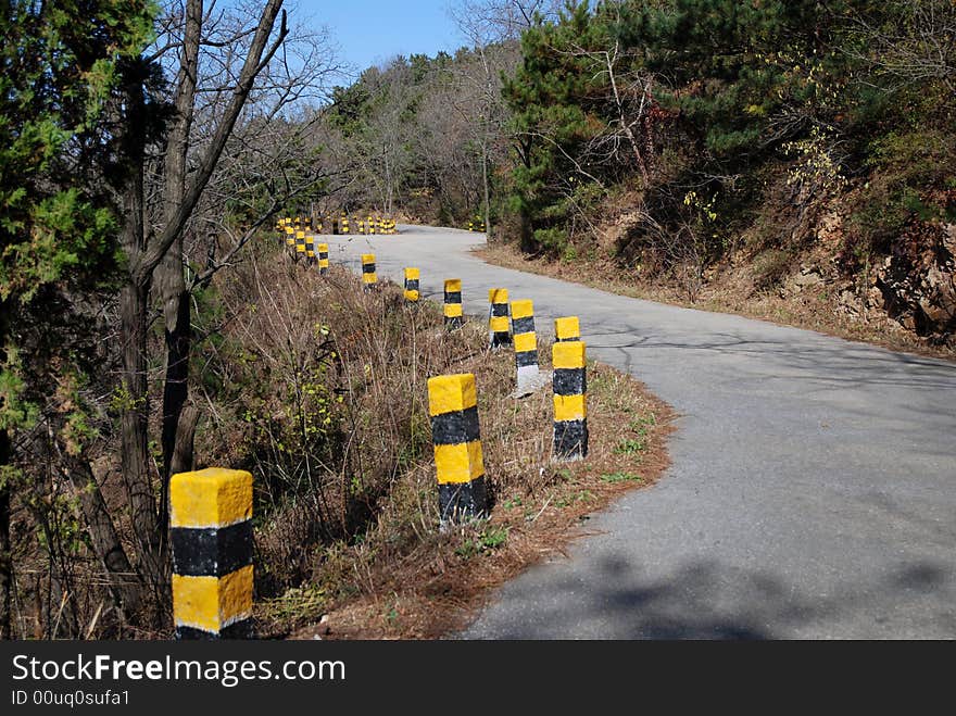 The quiet road to top of the hill.