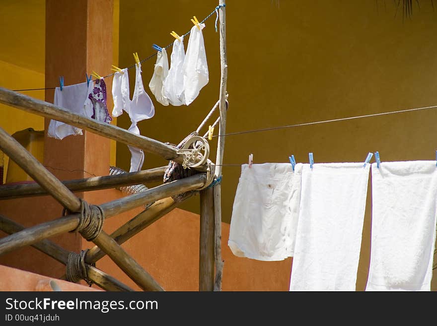 Clothes drying on a beach house. Clothes drying on a beach house