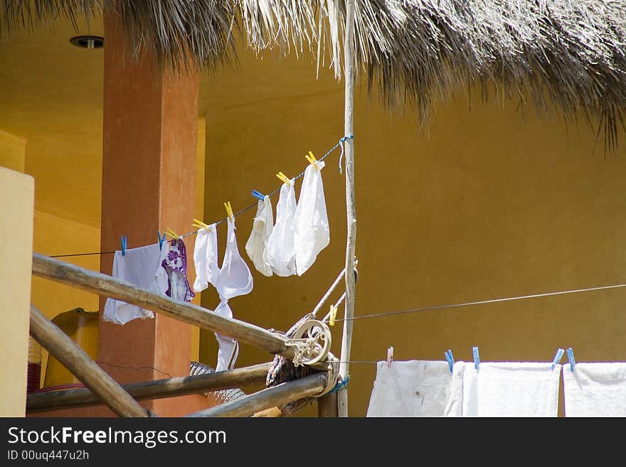 Clothes drying on a beach house. Clothes drying on a beach house