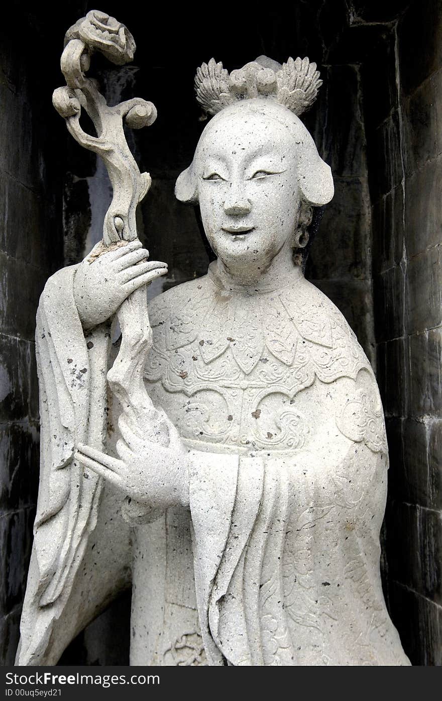 Thailand, Bangkok: Wat arun temple; stone statue of a chinese musician