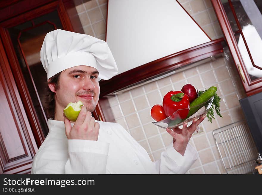 Cook cooking on the kitchen. Cook cooking on the kitchen