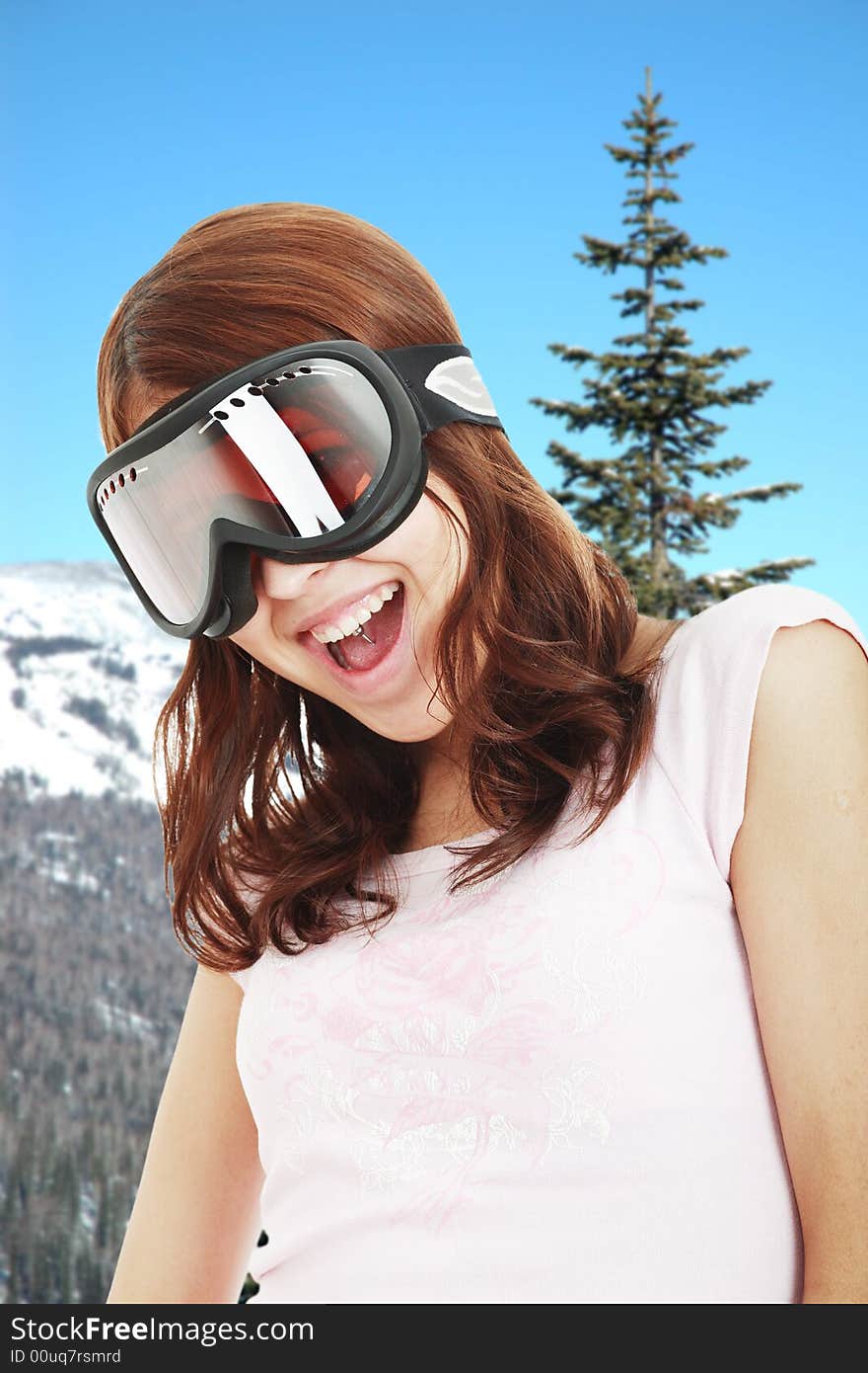 Portrait of a styled professional model. Theme: mountain skis