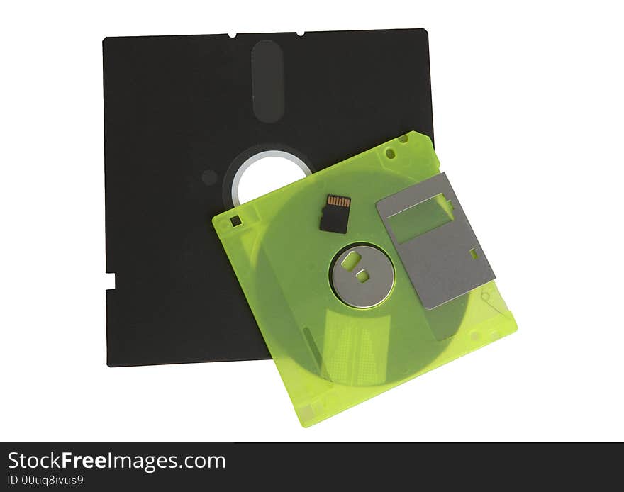 Floppy disks and flash drive on white