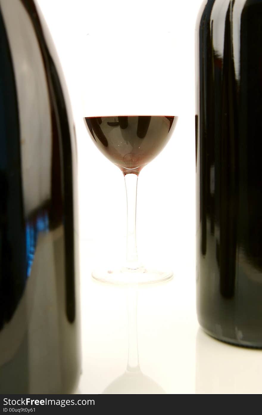 Red and white wine isolated against a white background. Red and white wine isolated against a white background