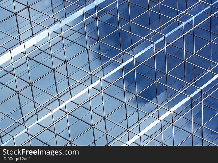 Photo of interesting reflection details in the corner of a steel frame curtain wall structure. Photo of interesting reflection details in the corner of a steel frame curtain wall structure.