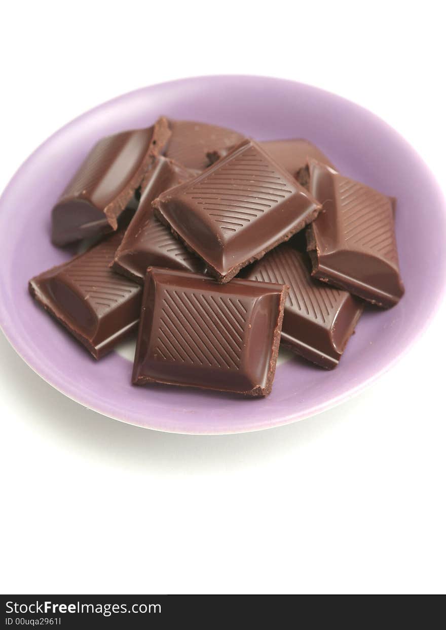 It is a lot of segments of chocolate lay on a plat